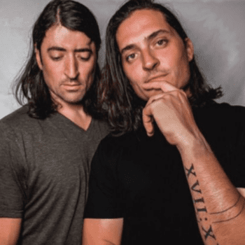 two men with long hair