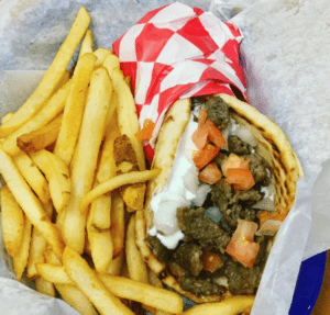 Gyro in a basket with french fries
